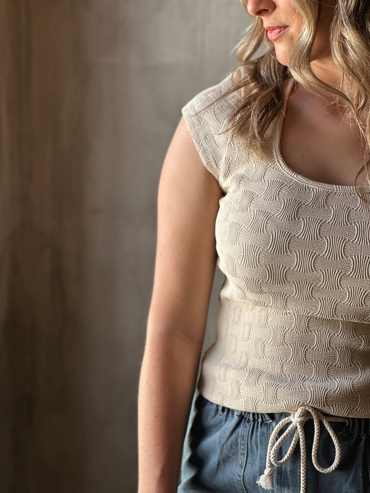 Front view of model wearing a textured Knit Square Neck Cap Sleeve Tee in cream
