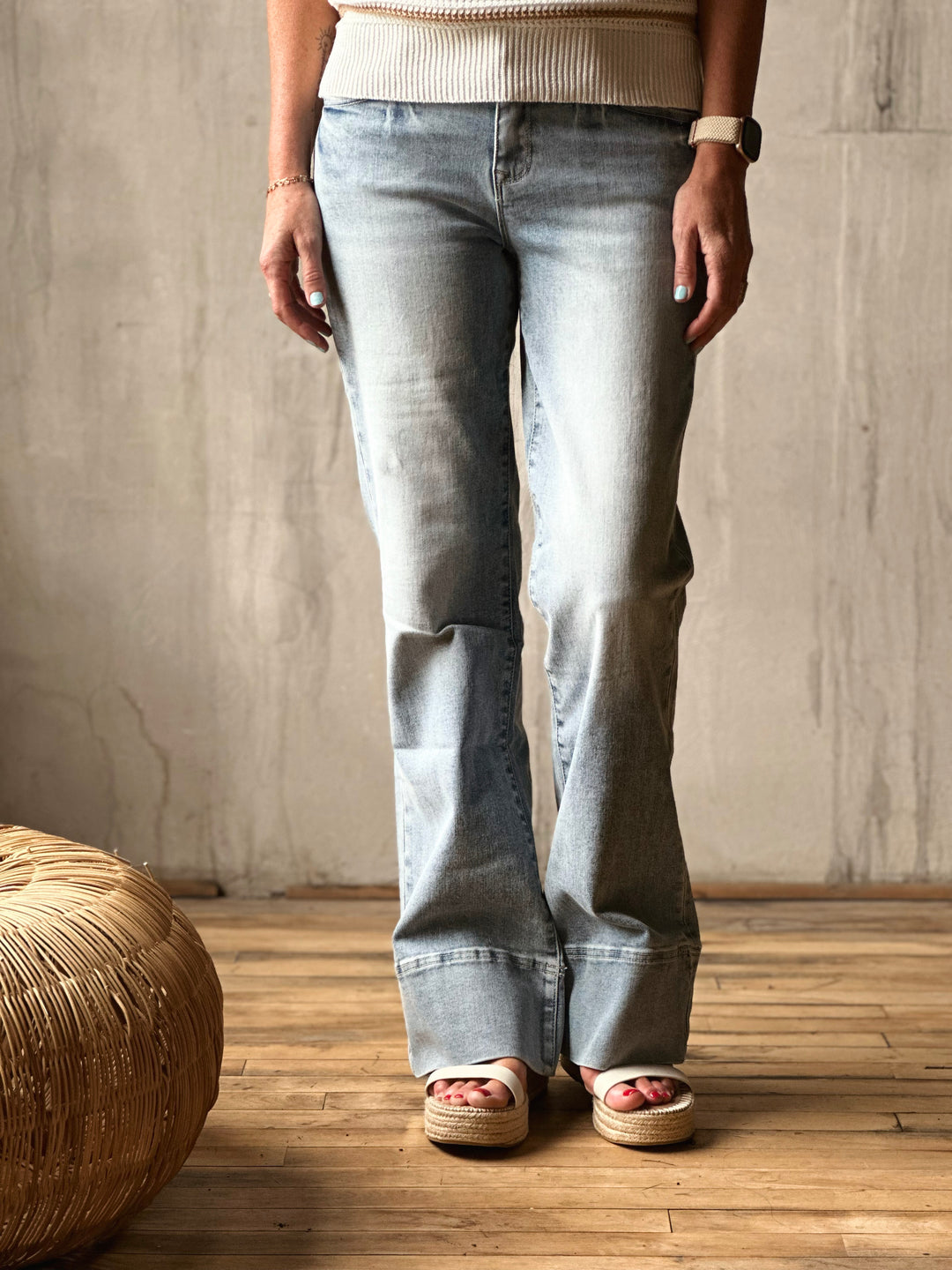 Front view of model wearing High-Rise Super Stretch Trouser Wide Leg Jeans