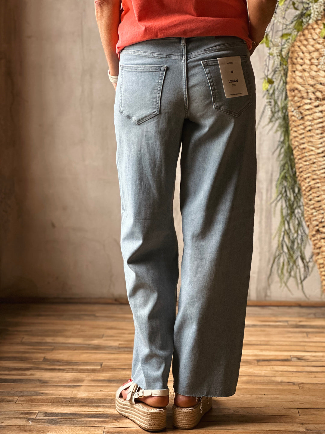 Back view of model wearing Mid-Rise Dad Fit Basic Jeans by Hidden, featured in a vintage wash
