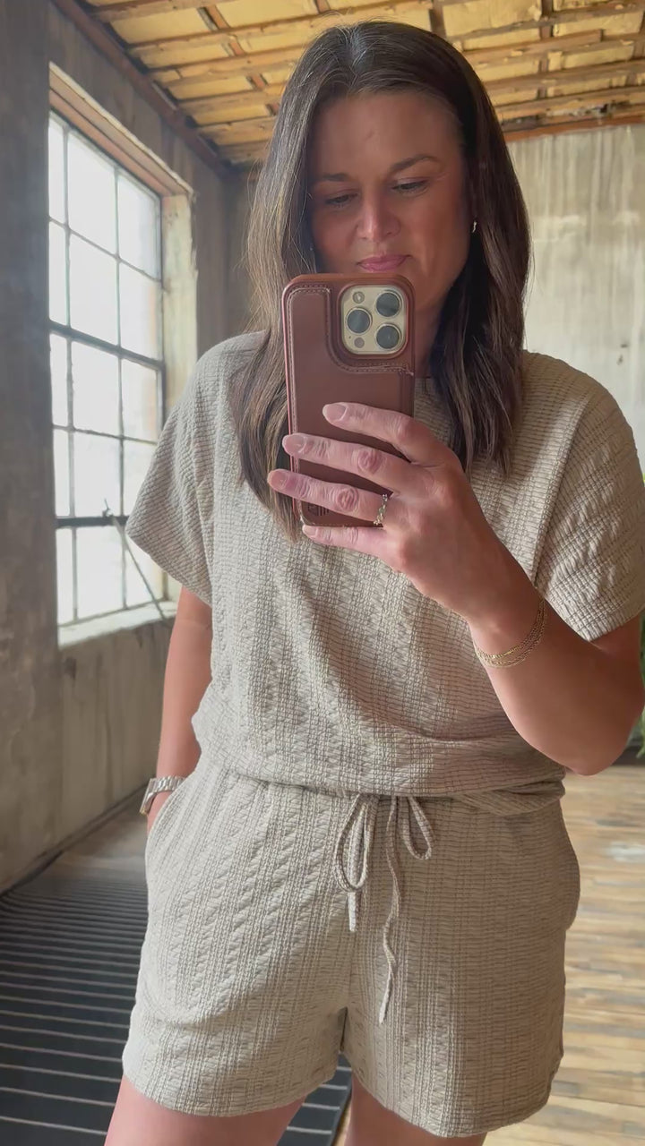 Video of model wearing textured knit top & shorts set with elastic waist in the color taupe
