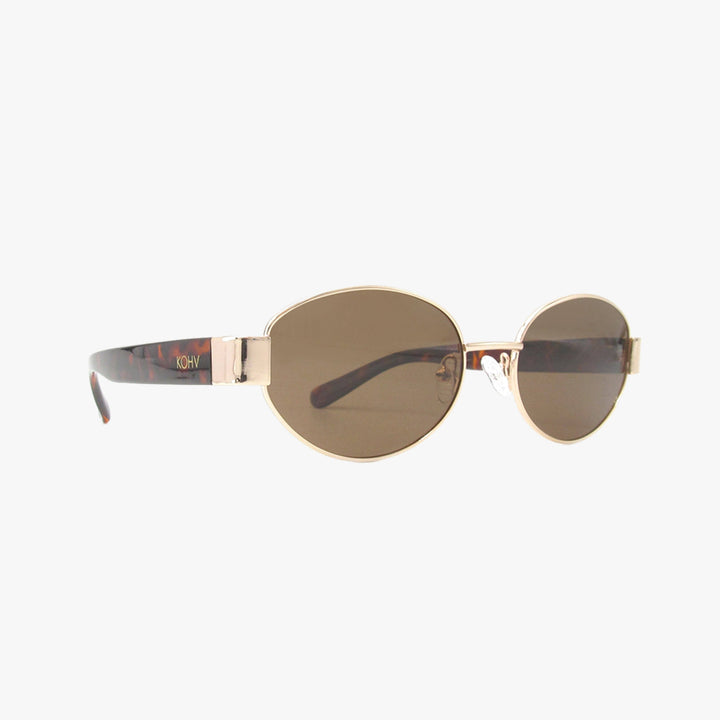 Round sunglasses with gold frame and brown lenses on a white background