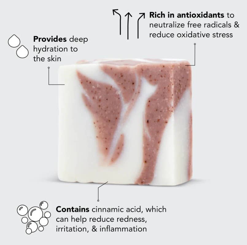 Marble-patterned soap bar with text about its benefits on a light gray background