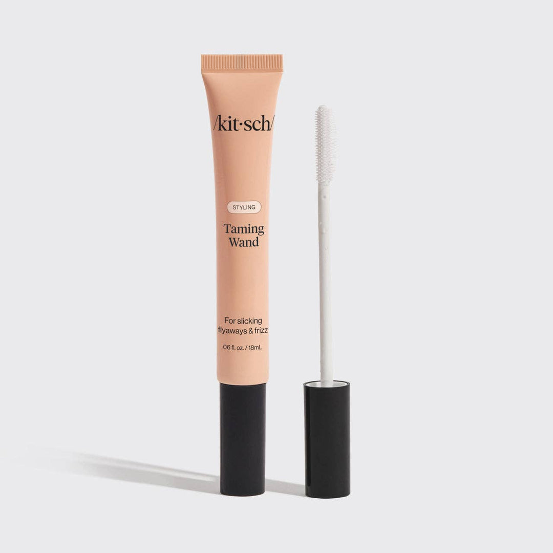 Kit-sch tanning wand with applicator on a white background