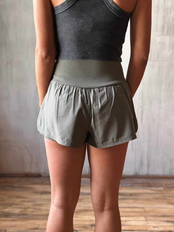 back view Air Flow Ribbed Waist Athletic Shorts – in moss