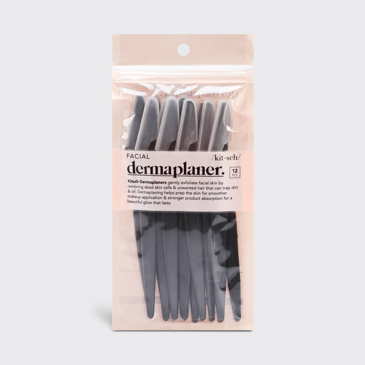 Packaging of Kikusui dermaplaner with clear window on a light gray background