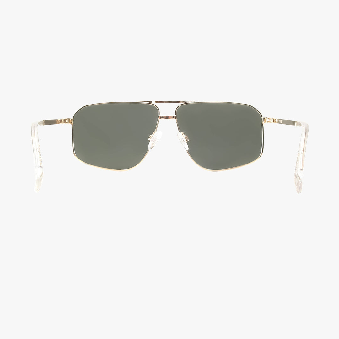 Sunglasses with gold frame and dark lenses on a white background