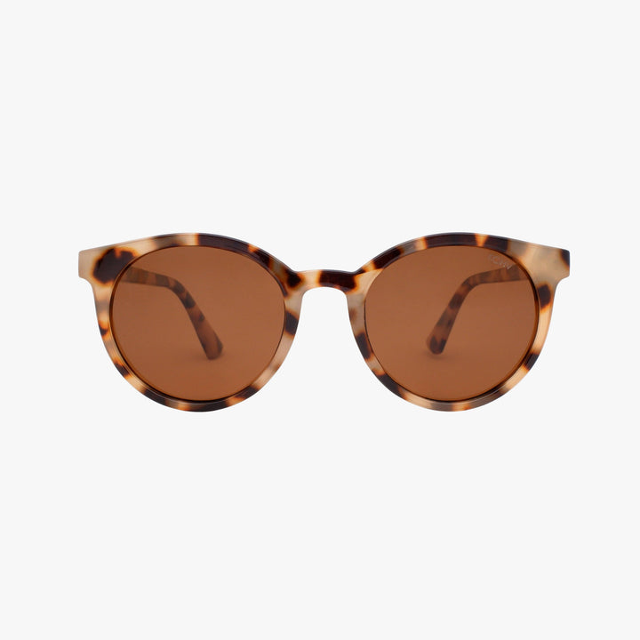 Sunglasses with tortoiseshell frame and brown lenses on a white background