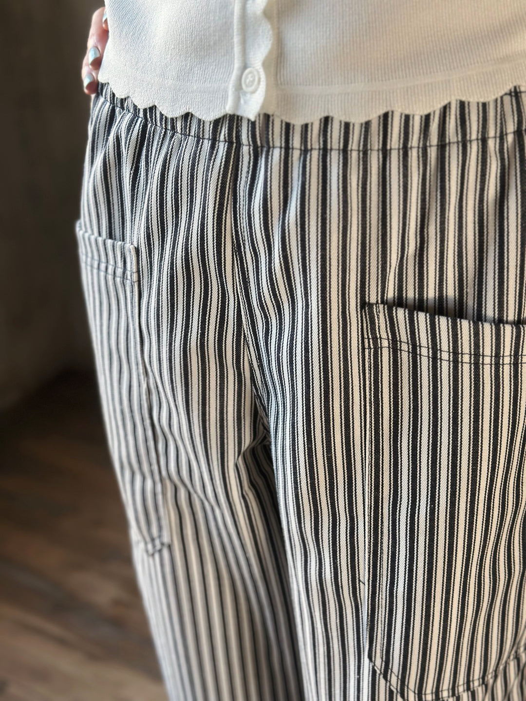 Close-up of striped pants with a blurred background