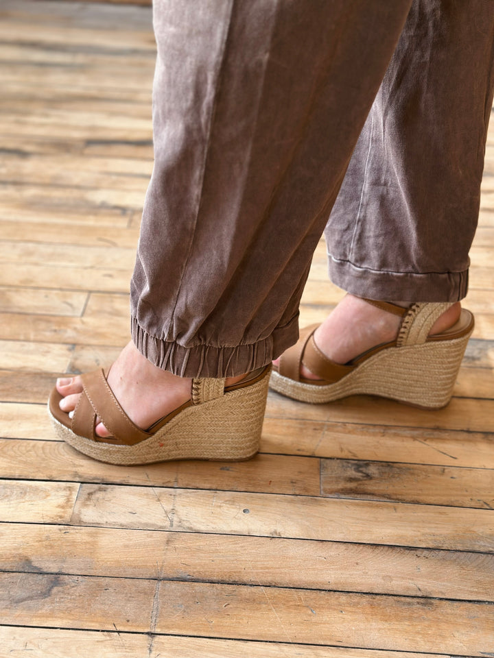 side ankle view mineral washed pants ankle length are paired with an elastic waistband and half-cinched hem in mocha