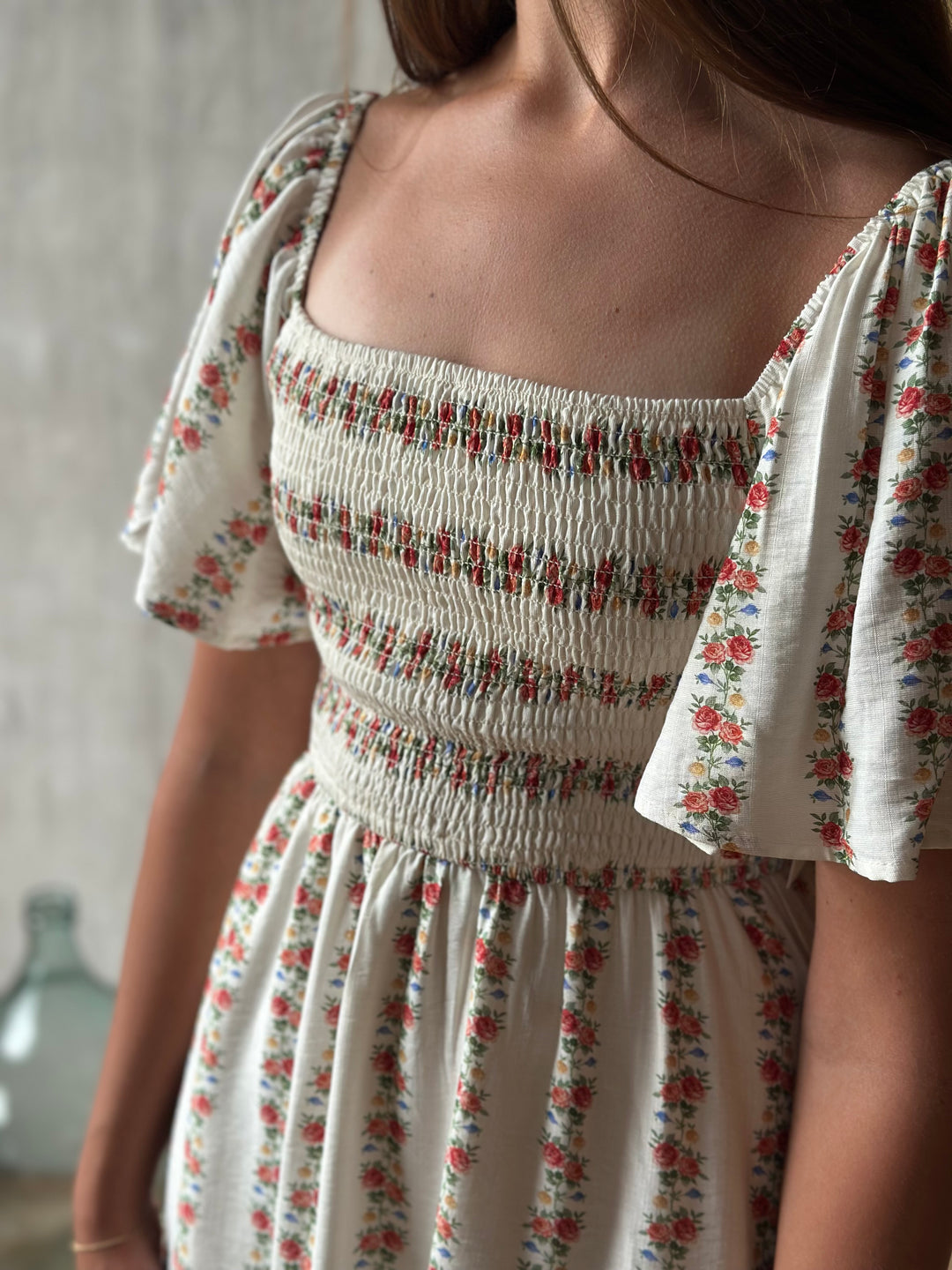 The Elara Bloom Mini Dress