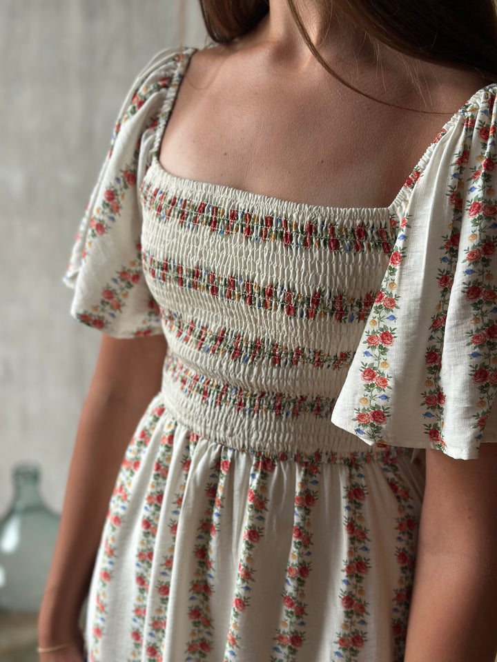 The Elara Bloom Mini Dress