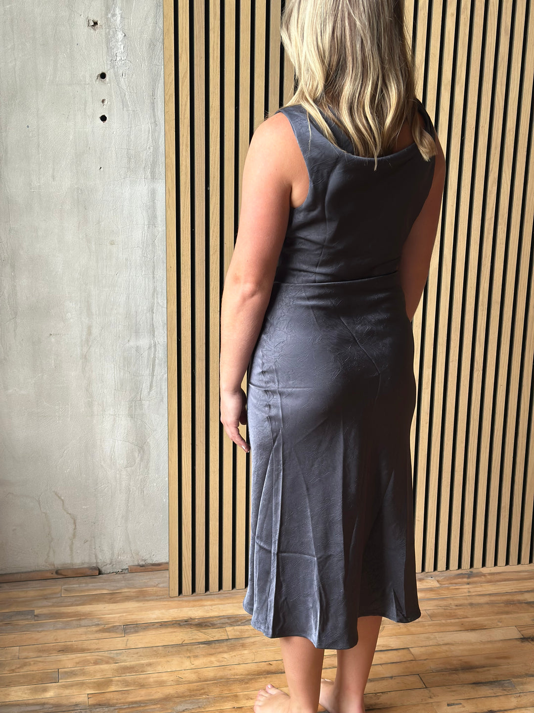 Slate gray satin midi dress, side view