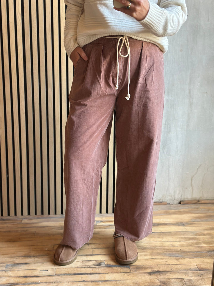 Dusty rose wide-leg drawstring pants, angled view