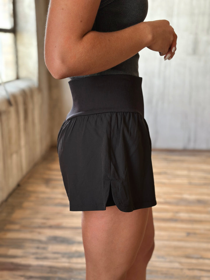 side view Air Flow Ribbed Waist Athletic Shorts – in black