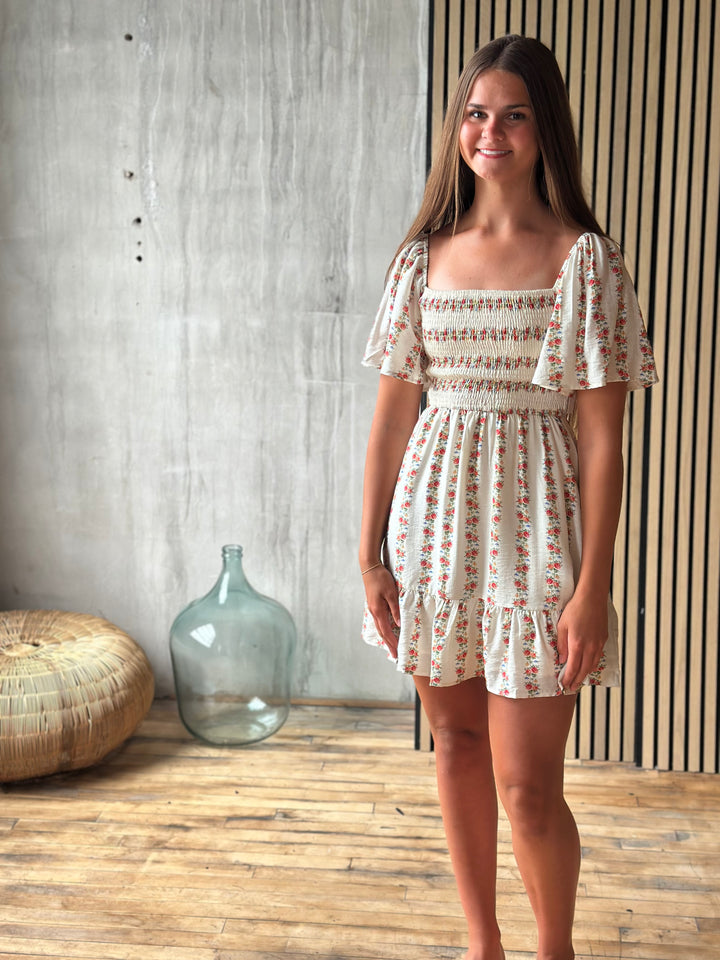 The Elara Bloom Mini Dress