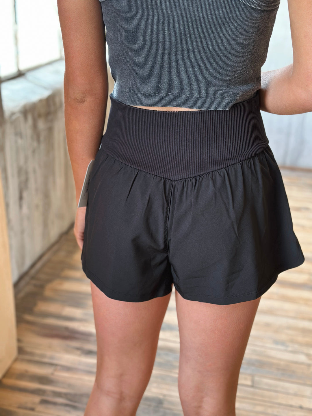 back view Air Flow Ribbed Waist Athletic Shorts – in black