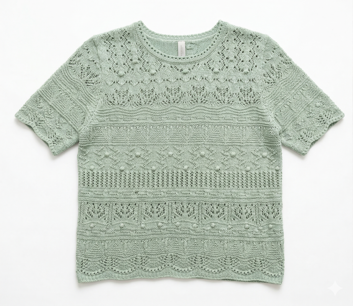 Mint green lace top on a white background