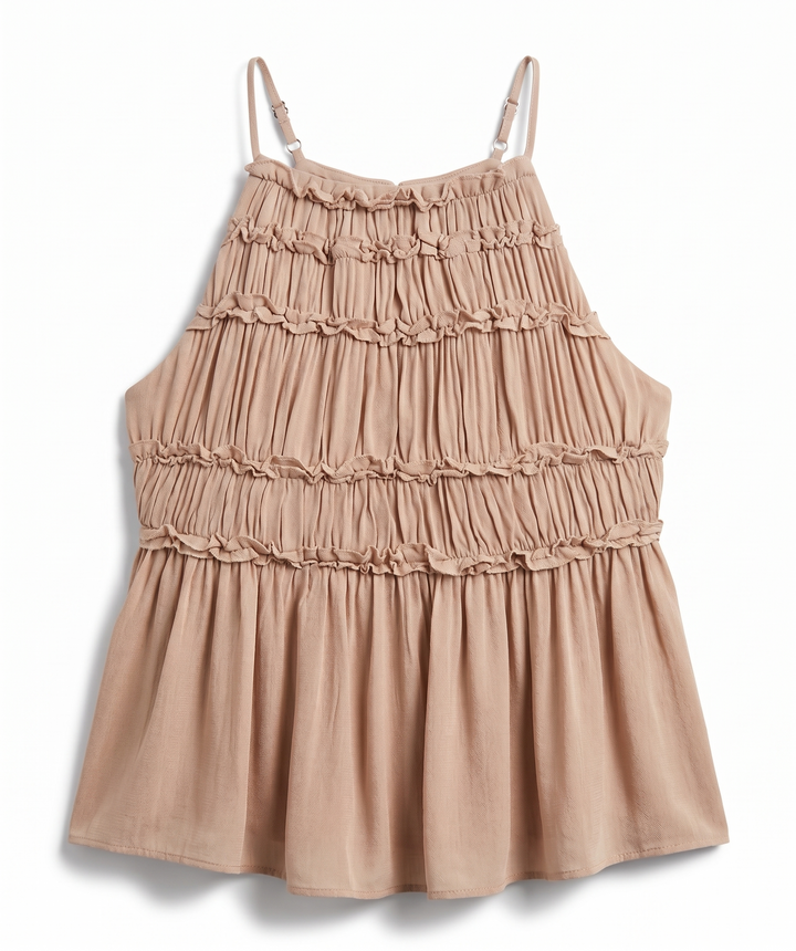 Beige ruffled top on a white background.
