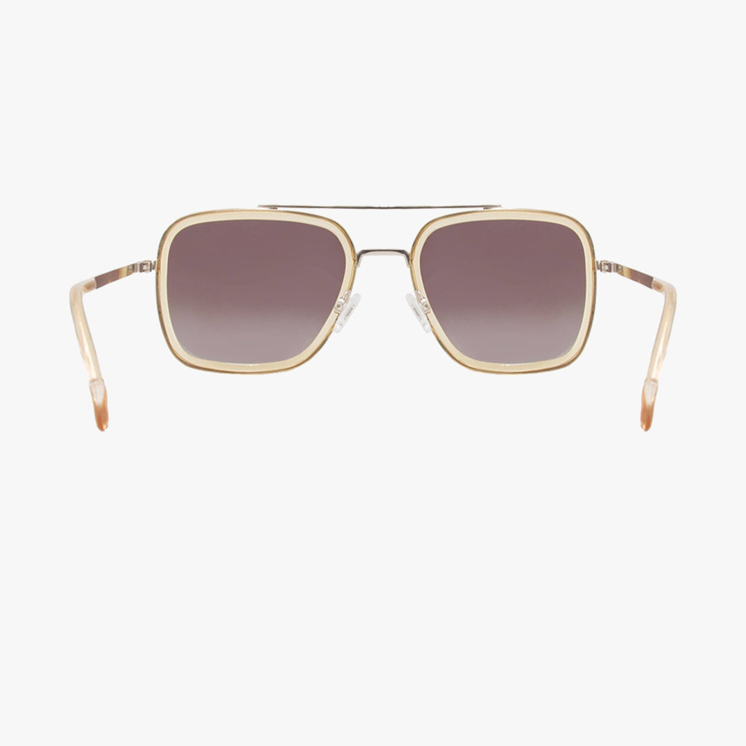 Gold-framed sunglasses with gradient lenses on a white background