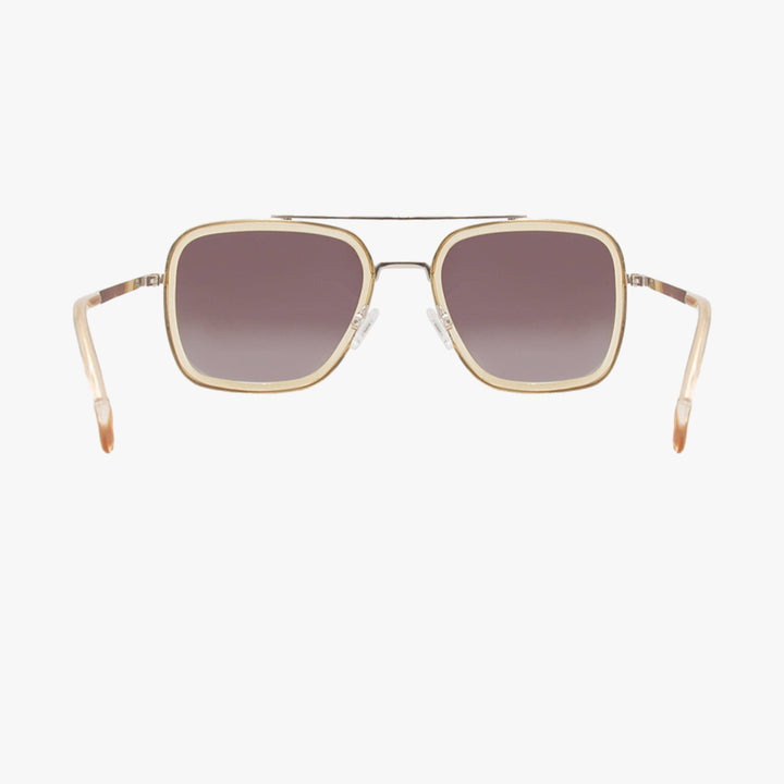 Gold-framed sunglasses with gradient lenses on a white background