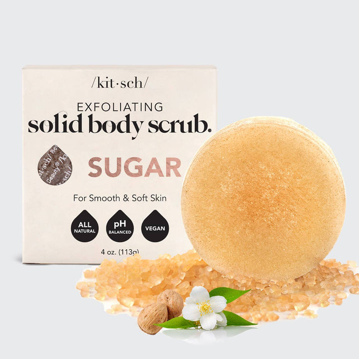 Exfoliating solid body scrub with packaging on a light gray background