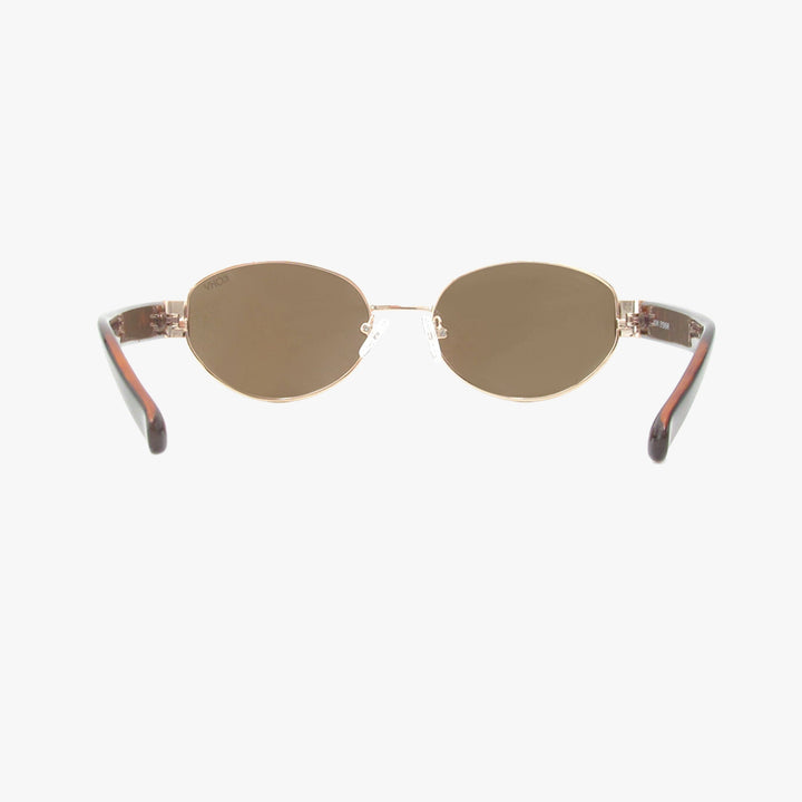 Sunglasses with gold frame and lenses on a white background