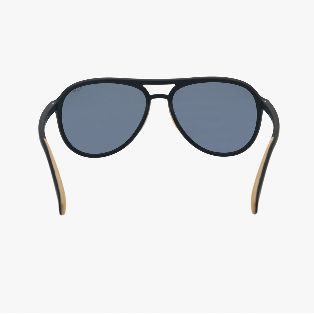 Black sunglasses with wooden accents on a white background