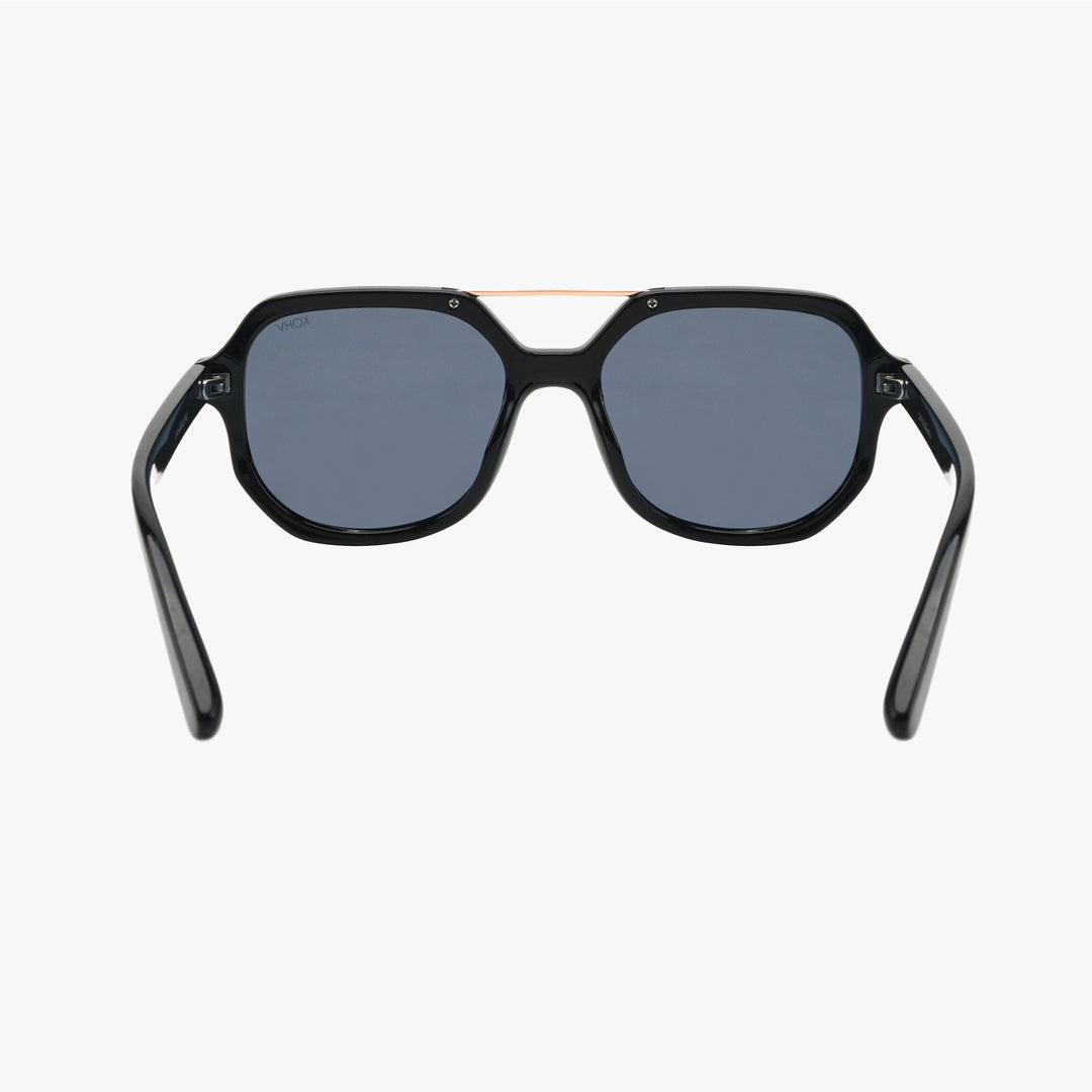Black sunglasses with dark lenses on a white background