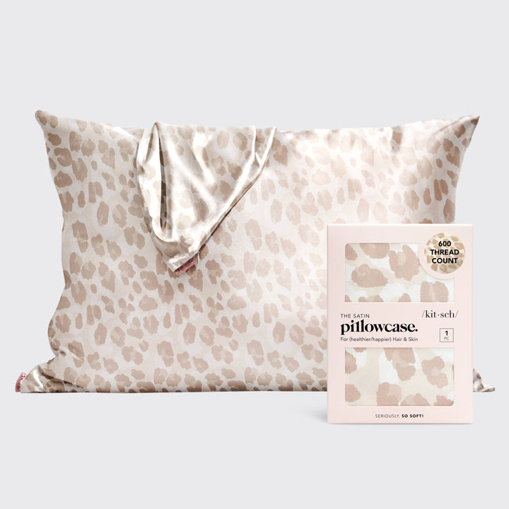 Leopard print pillowcase with packaging on a white background